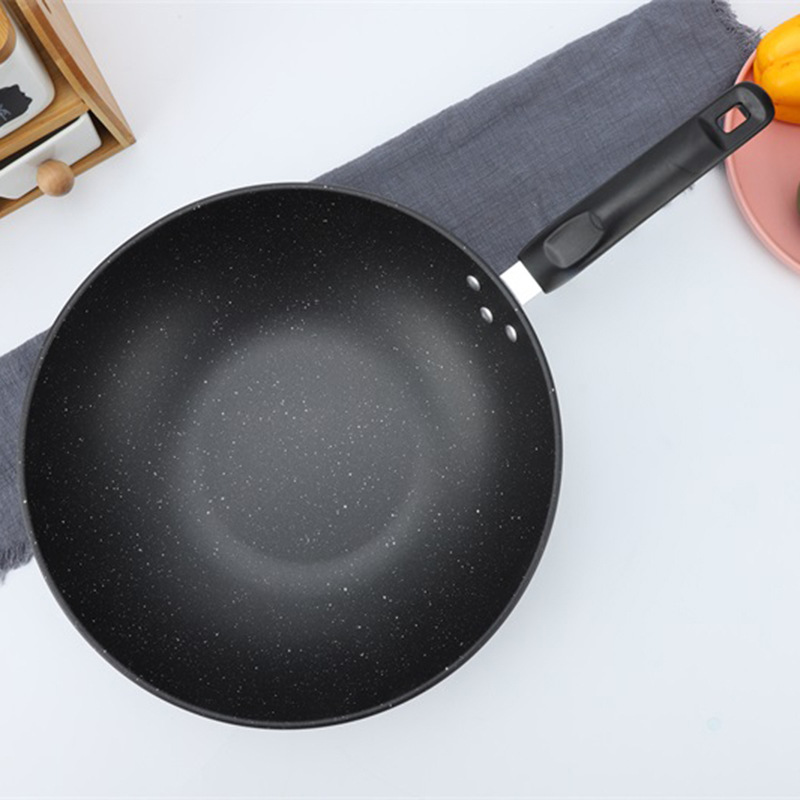 Suministro directo de fábrica de hierro wok hogar no recubierto sartén antiadherente Cocina de Inducción estufa de gas aplicable al por mayor