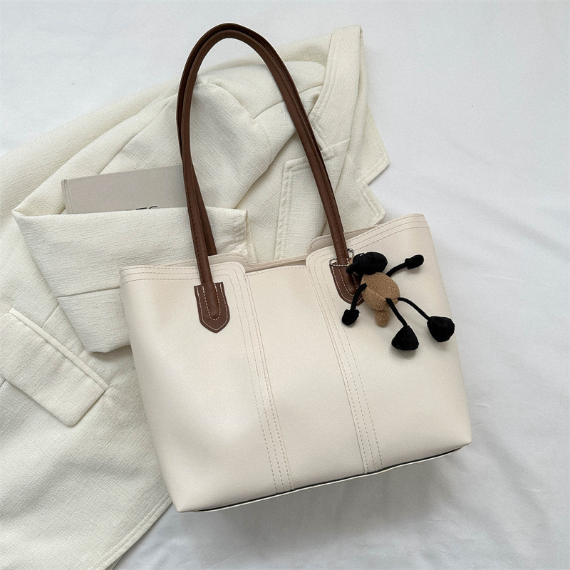 Estilo coreano versátil bolso texturizado de las mujeres 2023 otoño e invierno nuevo hombro axila bolsa popular bolsa de asas este año
