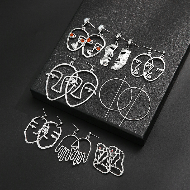 Fashion Creative Hollow Portrait Alloy Drop Earrings Set display picture 3