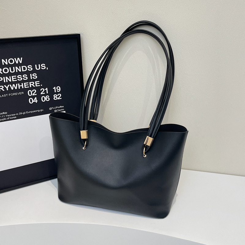 Bolsa de compras relajada para mujeres 2024 nueva moda europea y americana simple atmósfera bolsa de hombro de cuero suave sensación de viaje bolsa