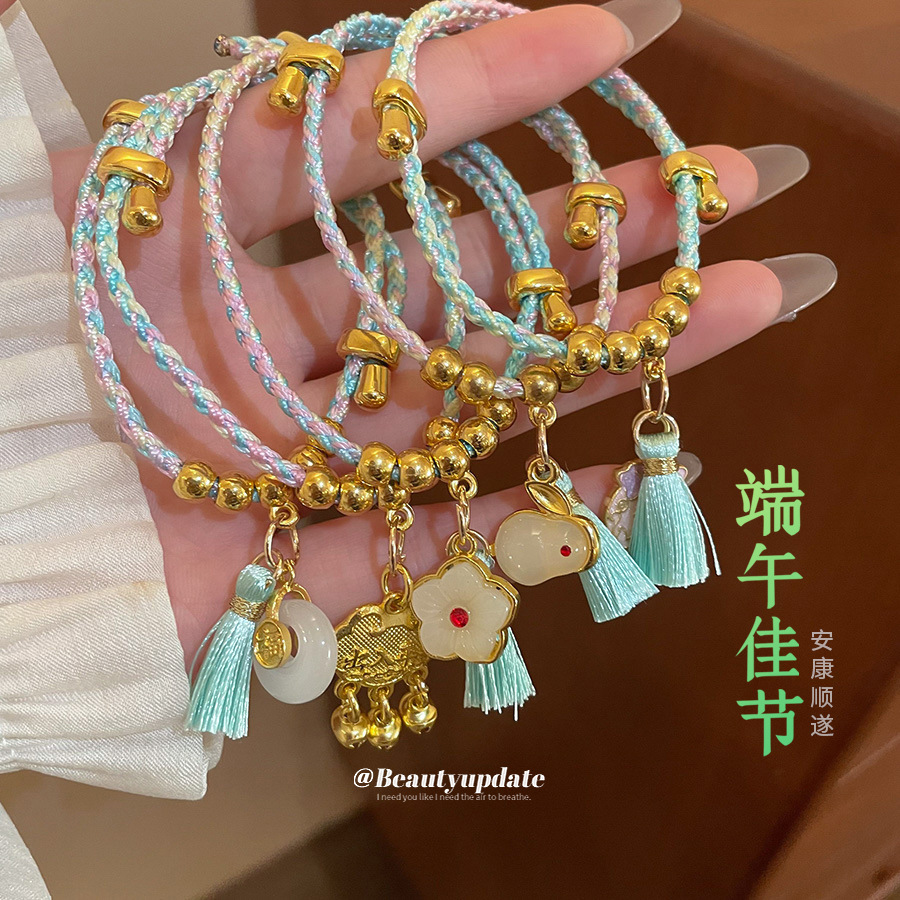 Dragon Boat Festival colorido cuerda tejida bolsa de la suerte colgante pulsera nueva pulsera de todo fósforo de moda china joyería de alta gama de nicho