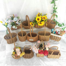 新款手工草编开业花篮批发 藤编织筐装饰手提ins包花器伴手礼竹篮