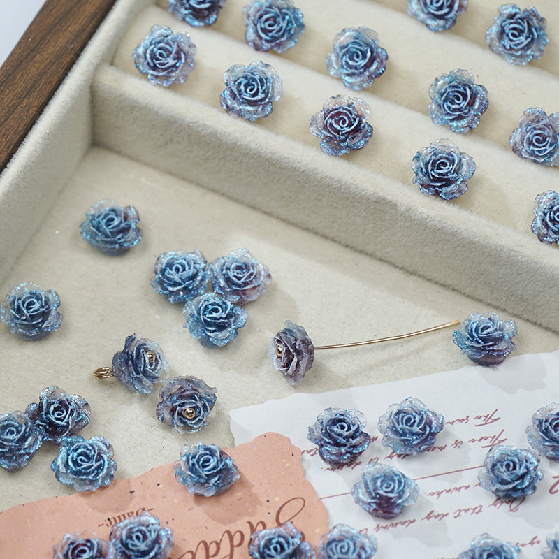 穴のない細いキラキラの柔らかいゴムの花の光はバラの花の片面の彫刻のdiyの手作りの数珠のネイルの携帯電話のケースの材料を変えます。