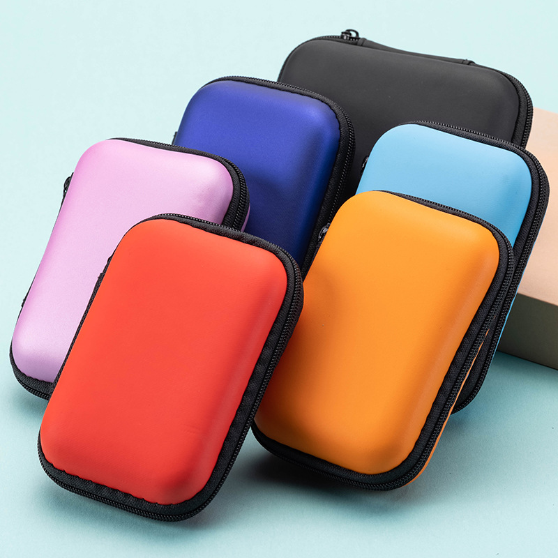 Fabricante en stock Eva bolsa de almacenamiento caja de almacenamiento de auriculares cable de datos bolsa de auriculares