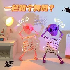 クリエイティブな踊るスカル時計仕掛けのスイング人形手動巻きスイングヘッド揺れ減圧おもちゃ