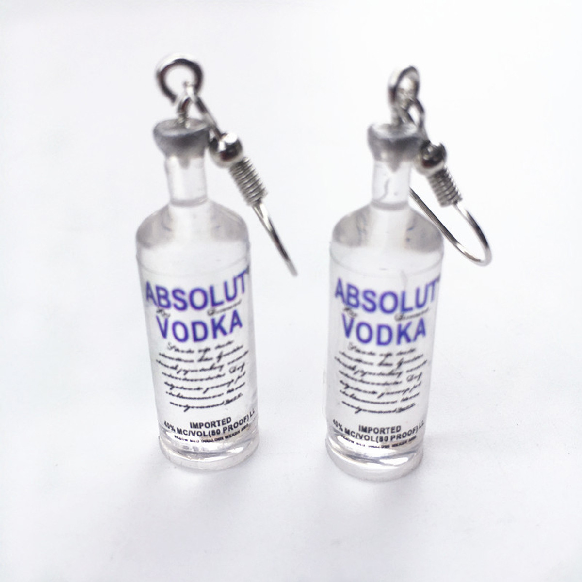 Nuevos auriculares coreanos botellas de cerveza divertidas botellas de agua mineral pendientes creativos joyas de orejas rojas en línea