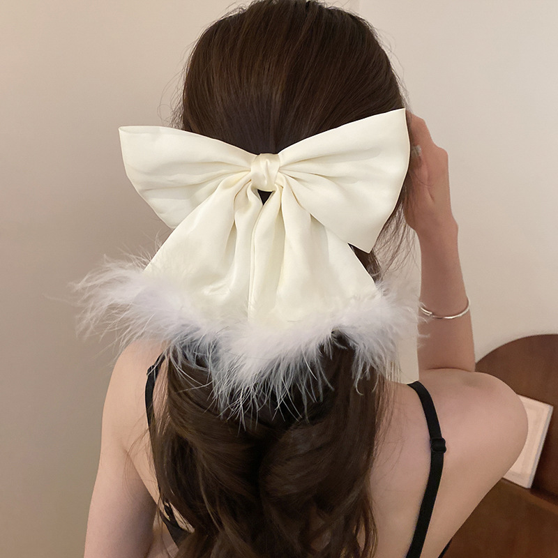 Women's Simple Style Bow Knot Alloy Cloth Feather Hair Clip display picture 13