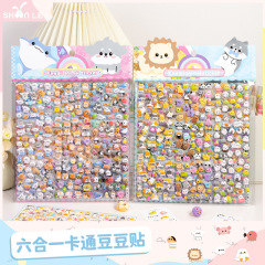 日常の手帳には綿を入れたかわいいアニメのマグカップの携帯ケースの装飾シールが貼られています。
