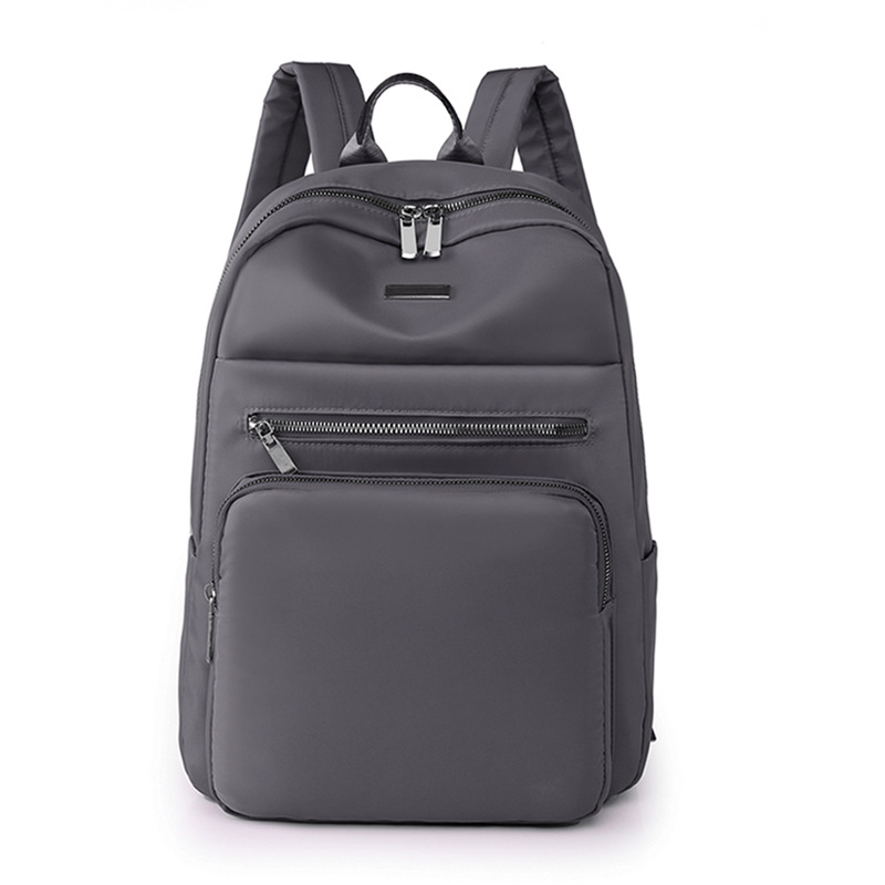 Fuente de origen 2023 nueva mochila de nailon para mujer de gran capacidad, mochila para computadora de viaje de negocios simple, mochila escolar