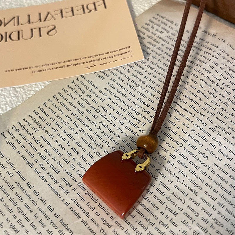 Nuevo estilo de cuero chino, colgante, collar de borlas, estilo étnico femenino, cadena de suéter retro de nicho, moda, artículos de alta gama