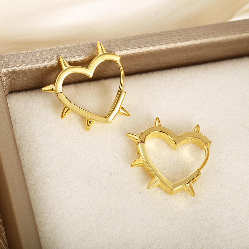 Xuping Cross-border hip-hop personalidad de estilo de amor en forma especial pendientes de orejas de temperamento de alto nivel de nicho mujeres al por mayor