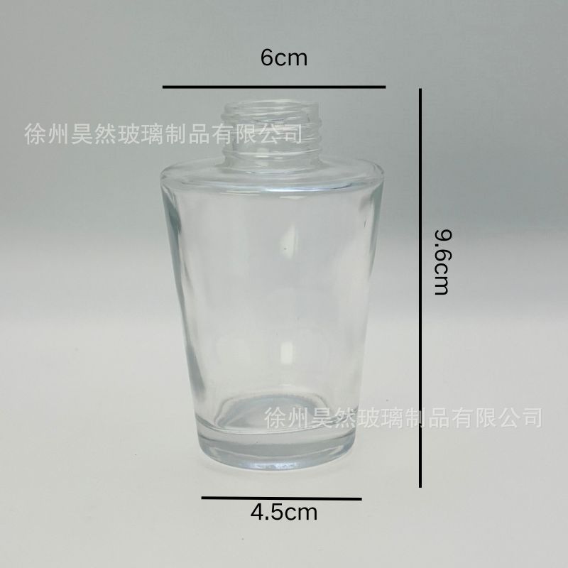 Botella vacía europea simple de alto valor nominal botella de fragancia de madera sólida botella de aceite esencial de caña cónica sin fuego 28 dientes botella de vidrio