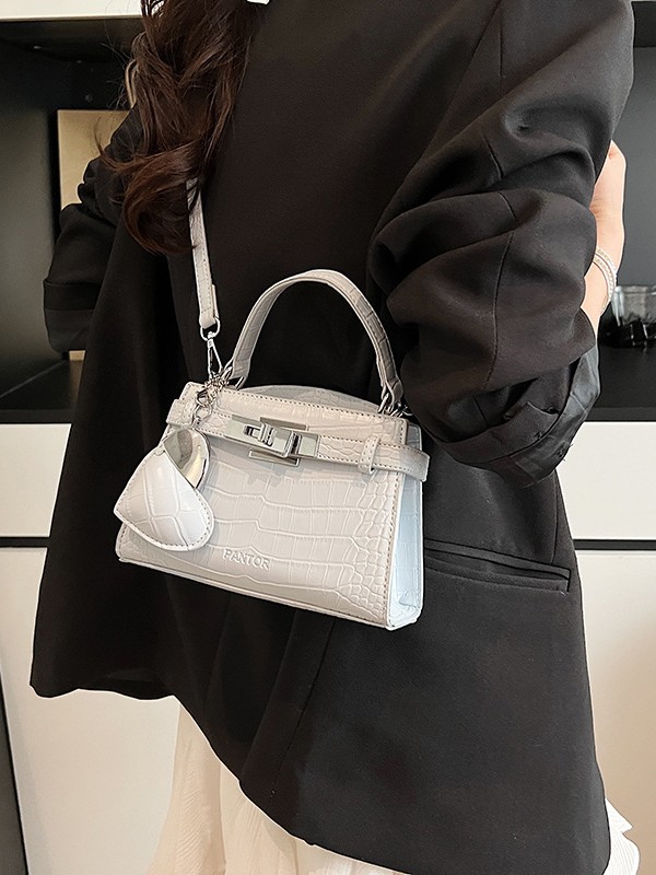 Bolso de mano de alta gama para mujer 2025 nuevo estilo retro patrón de cocodrilo Kelly bolso de mensajero de un solo hombro casual simple