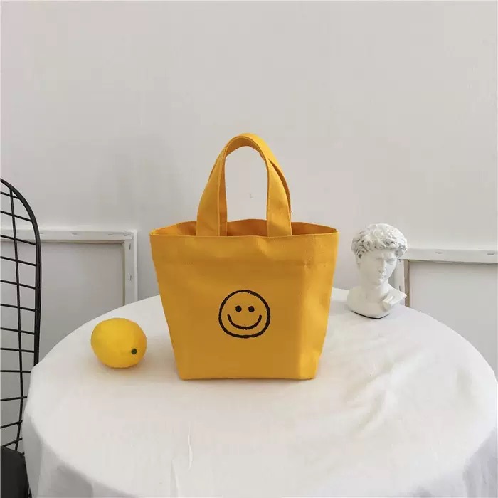 Yellow smiley handbag 17*20*26