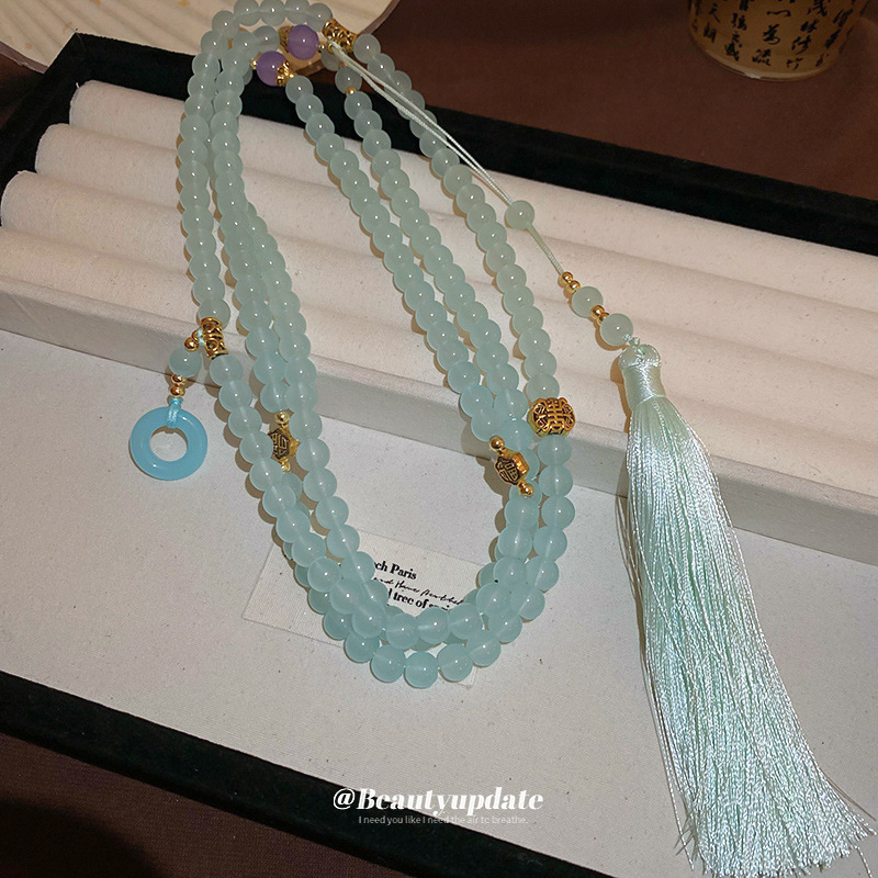 Estilo antiguo Zen azul azul vidrio borla collar nuevo estilo elegante estilo chino tapeta de presión cadena lateral estilo caliente falda de caballo accesorios mujeres