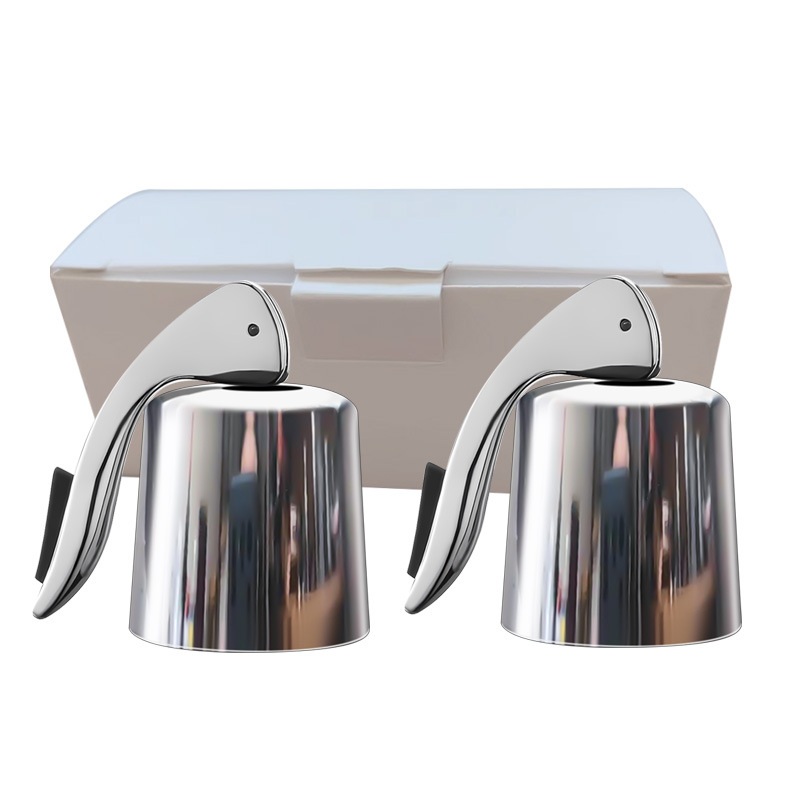 캡이 있는 은색 완전 플라스틱 손잡이 플러그 2개가 상자에 들어 있습니다.