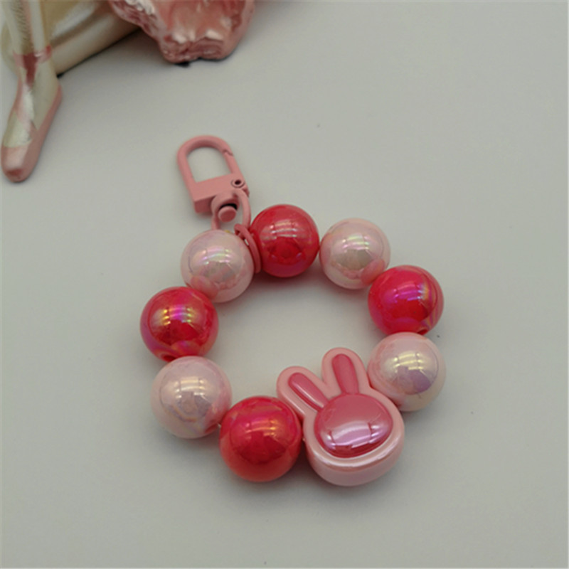 Nuevo llavero de cadena de cuentas redondas colgante Cadena de teléfono móvil pequeña perla colorida fresca color sólido gancho de puerta accesorios bolsa de auriculares