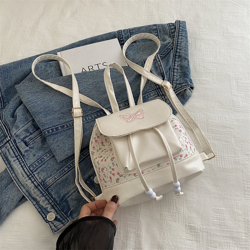 Mochila para niñas 2024 nuevo estilo de diseño de moda nicho mini pequeño blanco ligero lindo mochila de compras