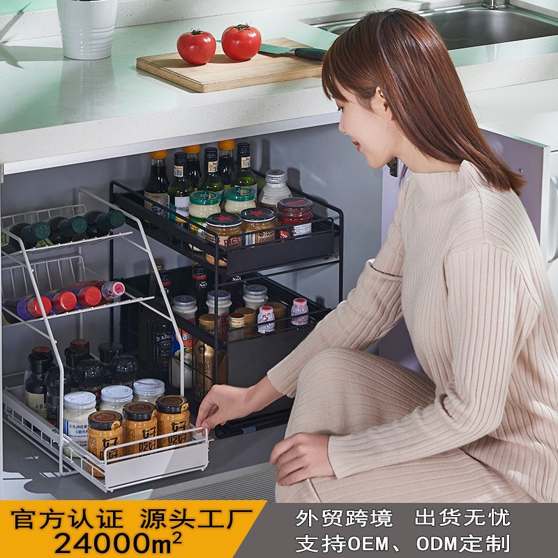 台所の下の水槽の物置棚は引き出し式の食器棚の下のトイレの調味料の大きいサイズの家庭用収納整理棚を押し引きます。