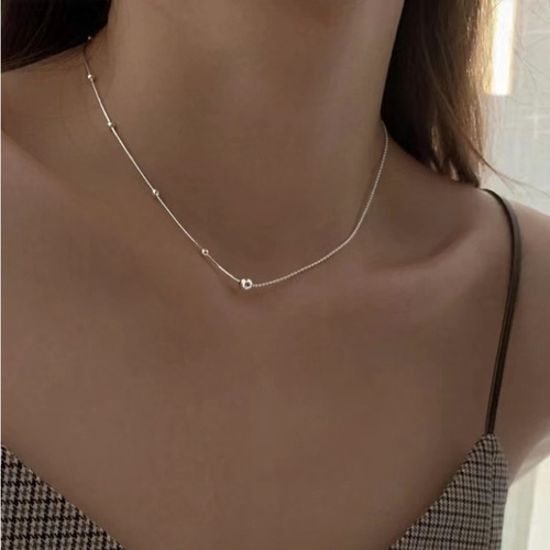 All-over 925 sterling silver simple asymmetric round bead snake bone splicing necklace for women with niche design and minimalist temperament