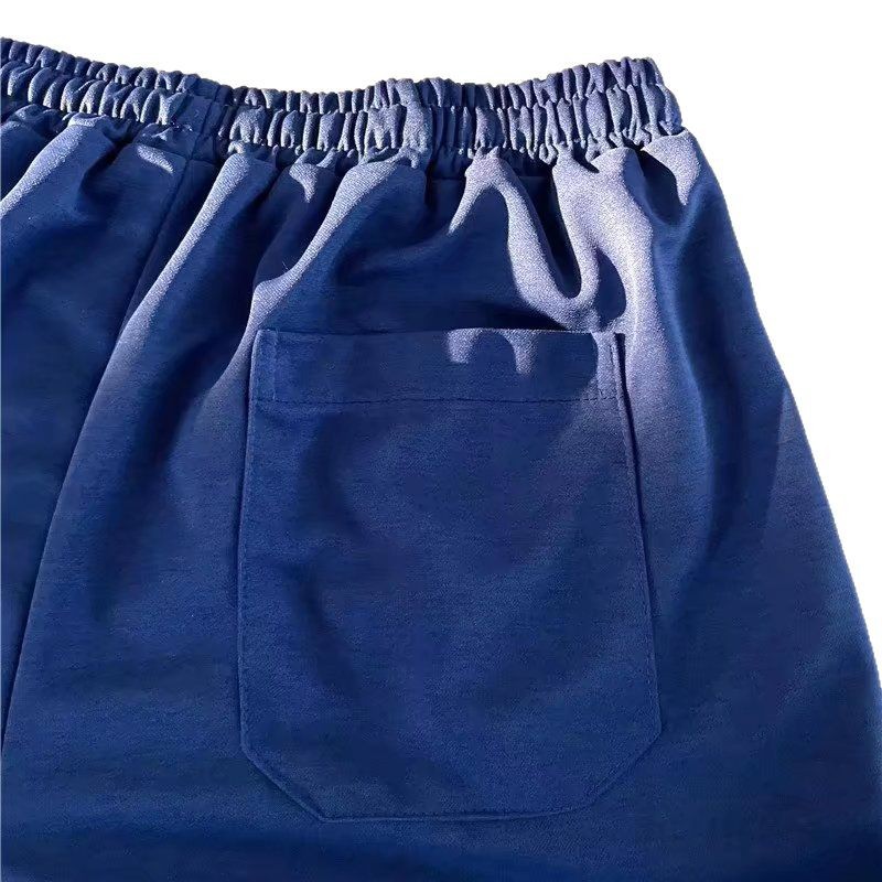 Marca de moda color sólido costura de contraste simple tubo recto suelto de cinco puntos pantalones deportivos casuales de verano pantalones cortos masculinos ins