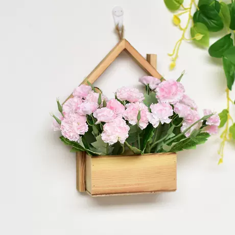 Wooden house + pink carnation