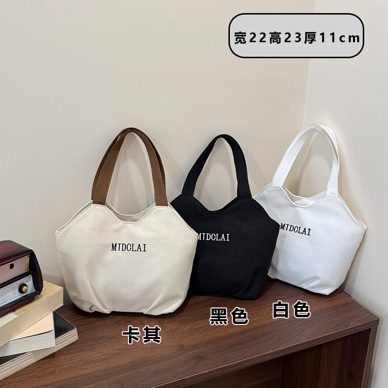 Japanese and Korean Style Simple Casual Handbag, Fashionable and Versatile Pleated Canvas Bag for Work, Commuting, and Lunchbox Storage Japanese and Korean Style Simple Casual Handbag, Fashionable and Versatile Pleated Canvas Bag for Work, Commuting, and Lunchbox Storage