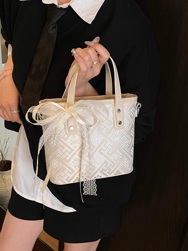 Bolso de cubo de agua súper fuego popular de verano para damas 2025 nuevo bolso de mano de tendencia salvaje bolso de mensajero de estilo nacional de sentido avanzado