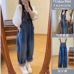 妊婦服の多ポケットの腰側の緩みは妊婦のデニムの背もたれのズボンのファッションの上着の2つのセットを調節することができます。