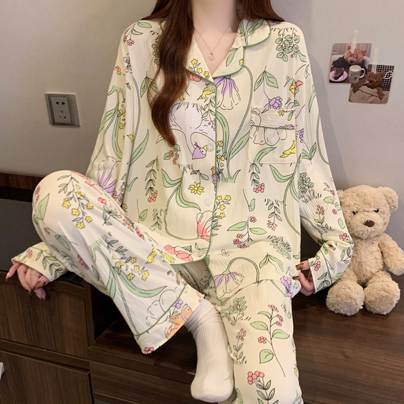 蝶結びのさくらんぼのプリントの女性のパジャマの春と秋の新型のカーディガンの長袖のズボンの部屋の服のスーツは実際に卸売りをたたきます。|undefined