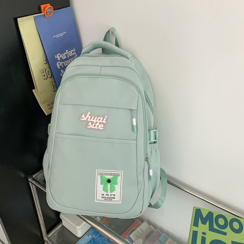 Mochilas escolares para estudiantes de secundaria 2025 bolsas de ocio simples y ligeras para mujeres de gran capacidad