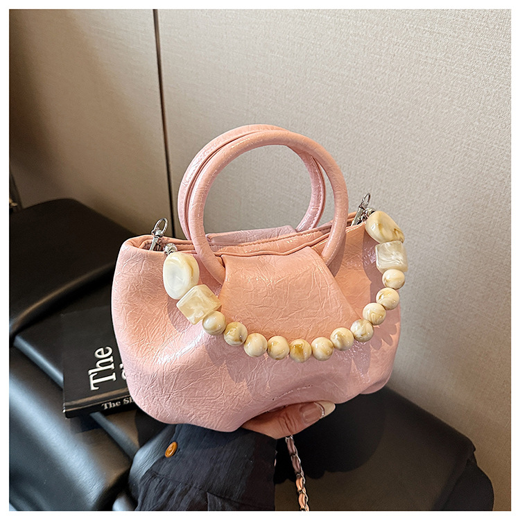 A stylish and trendy beaded bag for women, a new summer chain crossbody cloud bag for women in 2025 undefined