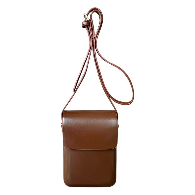 2023 nicho versátil vertical japonés y coreano cambiar bolsa de teléfono móvil bolsa de caja simple retro hombres y mujeres con textura bolsa de mensajero moda