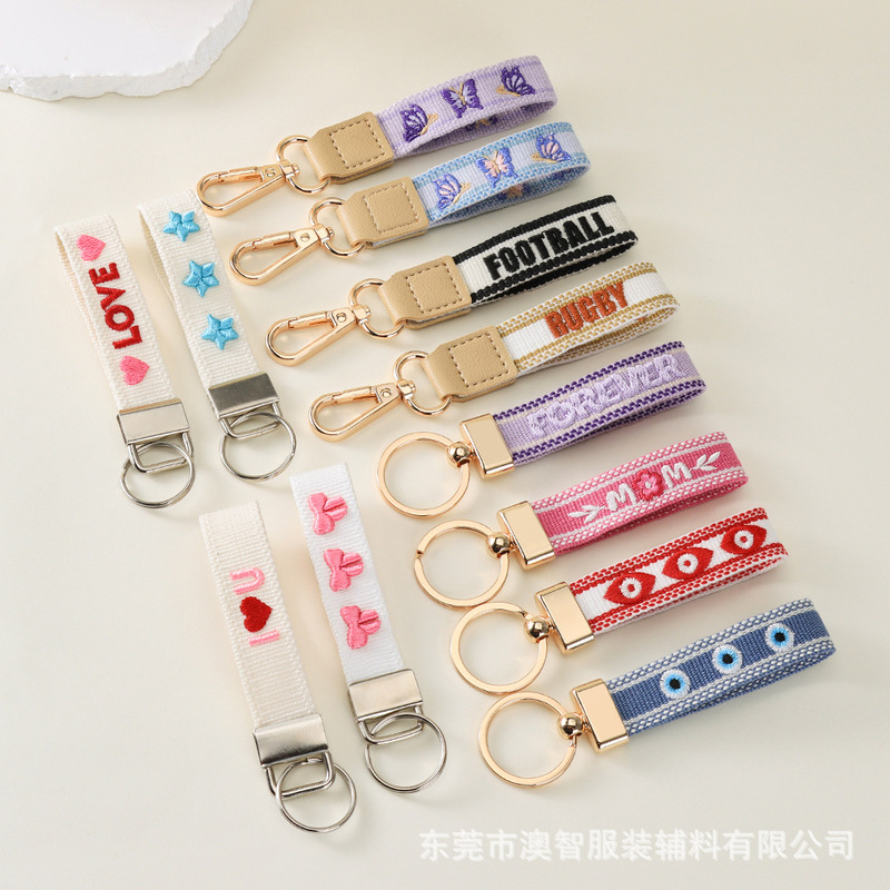 貿易ジュエリーハンギングストラップ携帯電話キーホルダーバッグ装飾コンピュータ刺繍文字隆起パターンパーソナライズされたアクセサリー|undefined