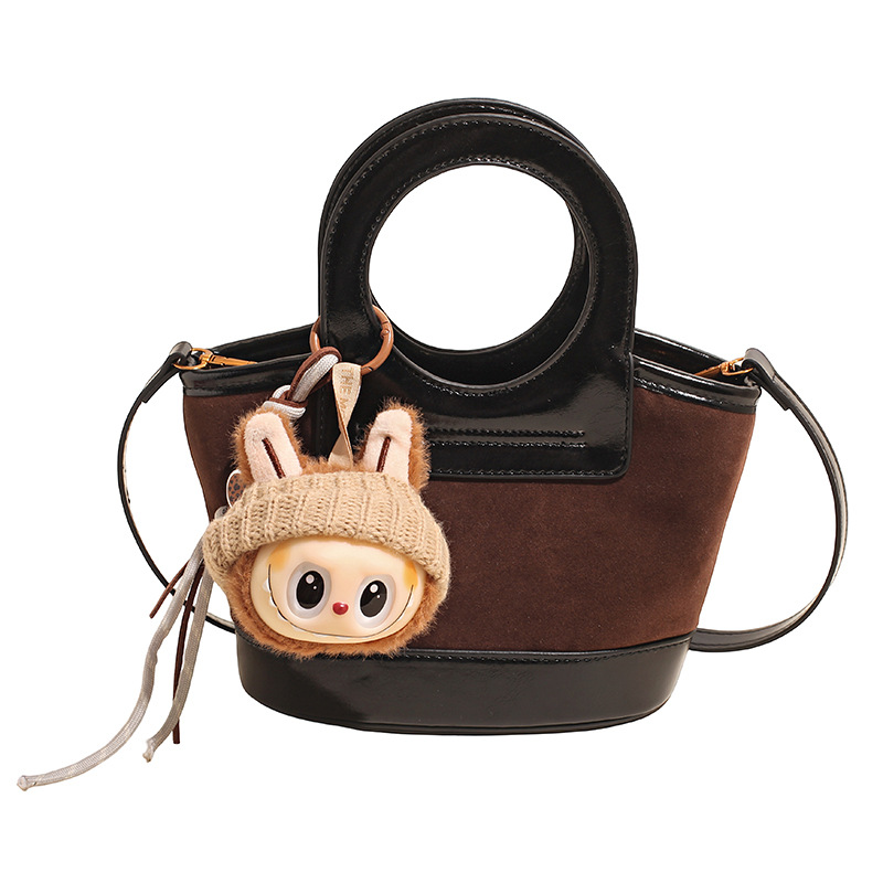 Bolso de mano coreano transfronterizo empalmado bolso de cubo de agua mujer otoño / invierno 2025 nuevo estilo de moda bolso de hombro bolso de viaje