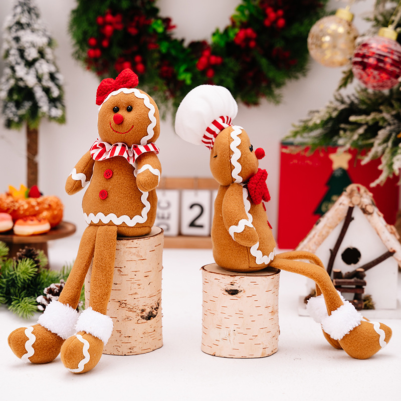 2種類のアマゾンの新しいクリスマスの姜パイ人は足の公仔のクリスマスのビスケット人を掛けてショーウインドーの雰囲気を飾っています。|undefined