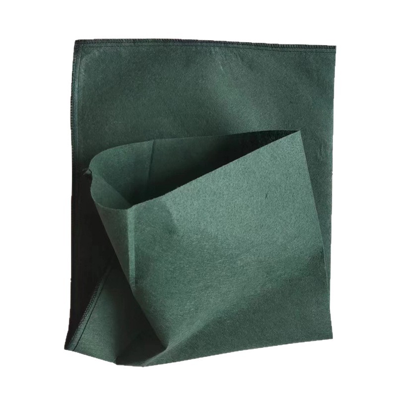 Bolsa ecológica de filamento corto de semilla de hierba verde, bolsa de vegetación para protección de pendientes resistentes al envejecimiento y protección ambiental de diques de río