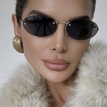 椭圆无框太阳镜铆钉2024新款时尚欧美墨镜跨境潮流街拍太阳眼镜女