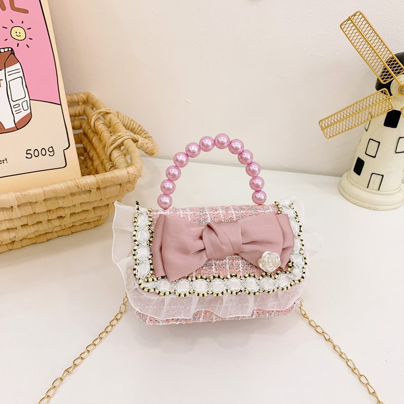 Niña tween pequeña bolsa de hombro arco encantadora princesa mochila de perlas de aire extranjero para niños bolsos lotes