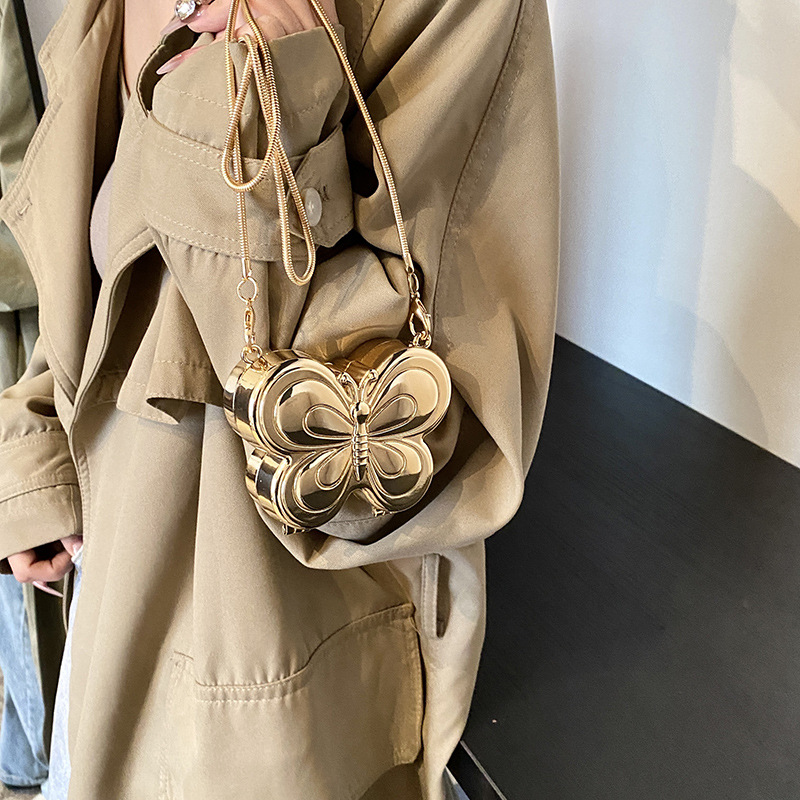 Bolso de cena de lápiz labial dorado mariposa transfronterizo bolso de moda europeo y americano flor de alta gama metal pequeño bolso femenino de moda