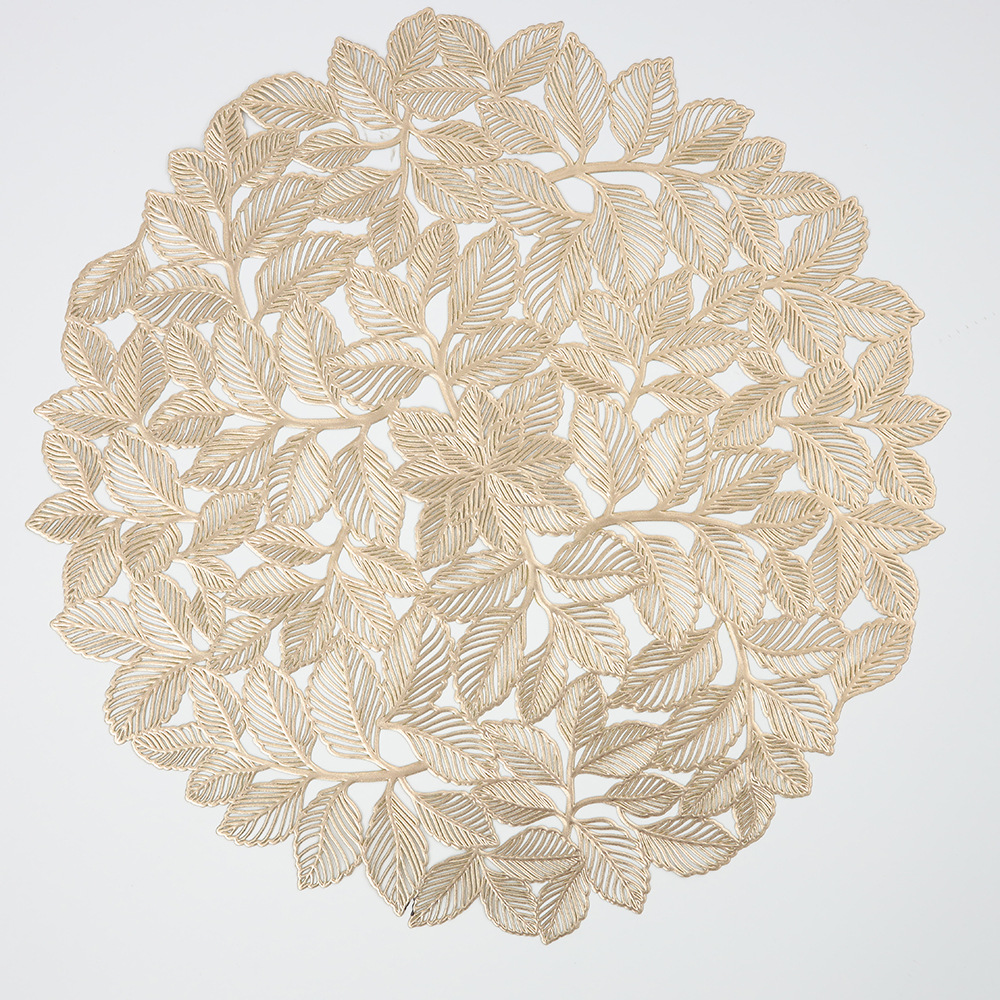 2023 Nuevo mantel de pvc hueco redondo hojas doradas oro plata impermeable antideslizante estera de aislamiento estera de mesa montaña