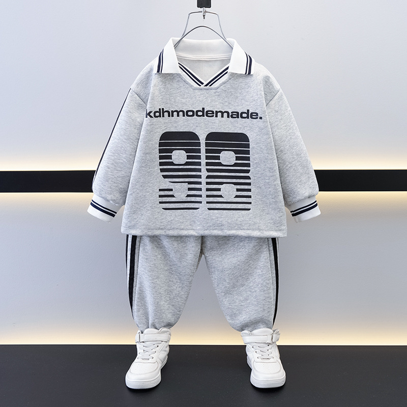 7688 Traje de suéter fresco de moda para niños Primavera y otoño Manga larga suelta deportiva Traje de dos piezas 2025 Nueva ropa casual para niños