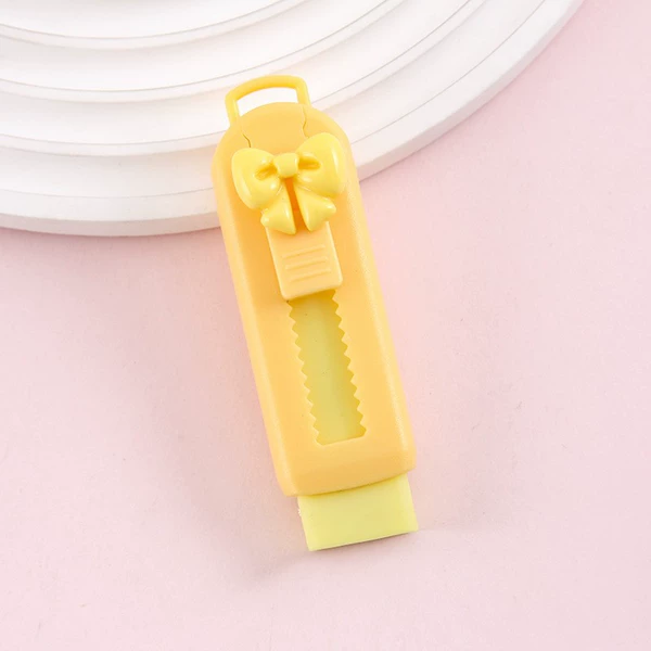 Yellow eraser with bow
