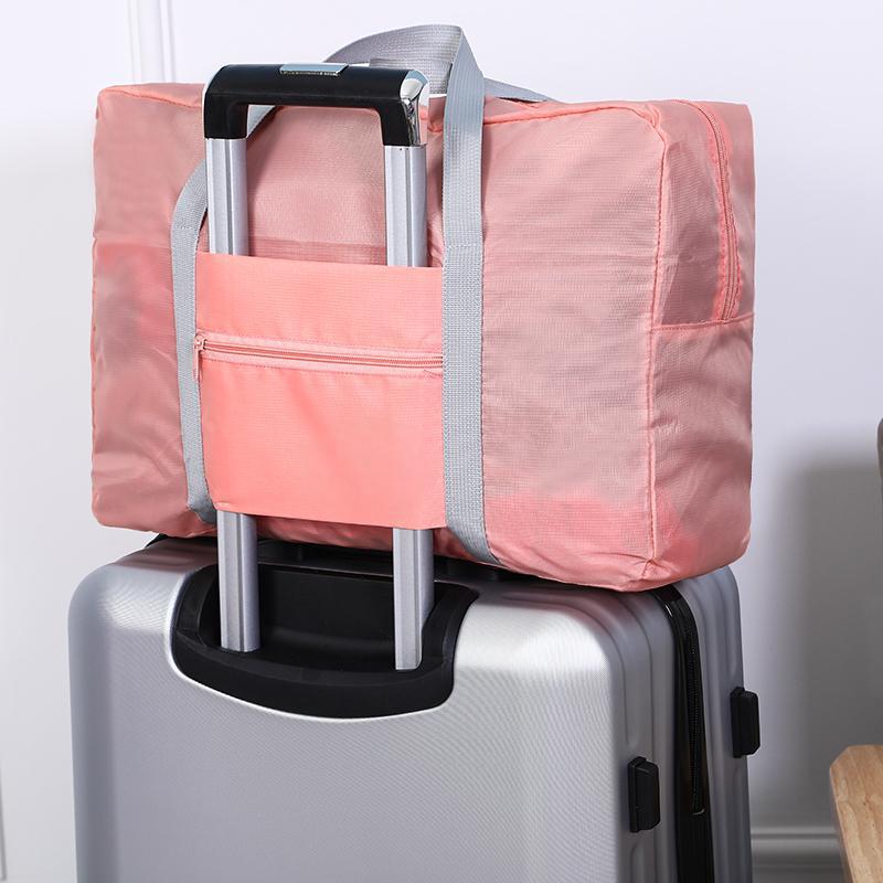 Bolsas de viaje personalizadas se pueden imprimir con logotipos, bolsas de mano de gran capacidad, bolsas de embalaje para equipaje, bolsas plegables para avión