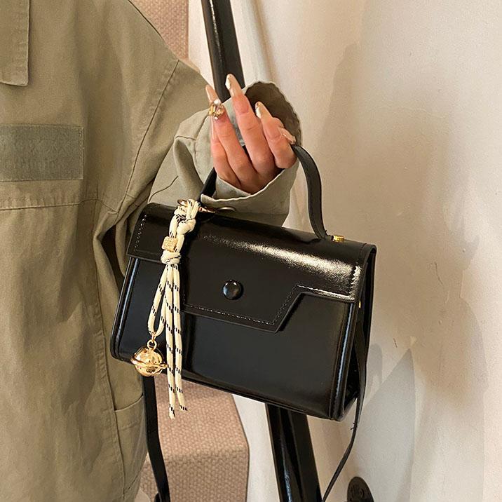 Simple retro bolso de mano para mujeres 2025 nuevo estilo de moda ocio bolso de hombro de tendencia explosiva nicho mochila