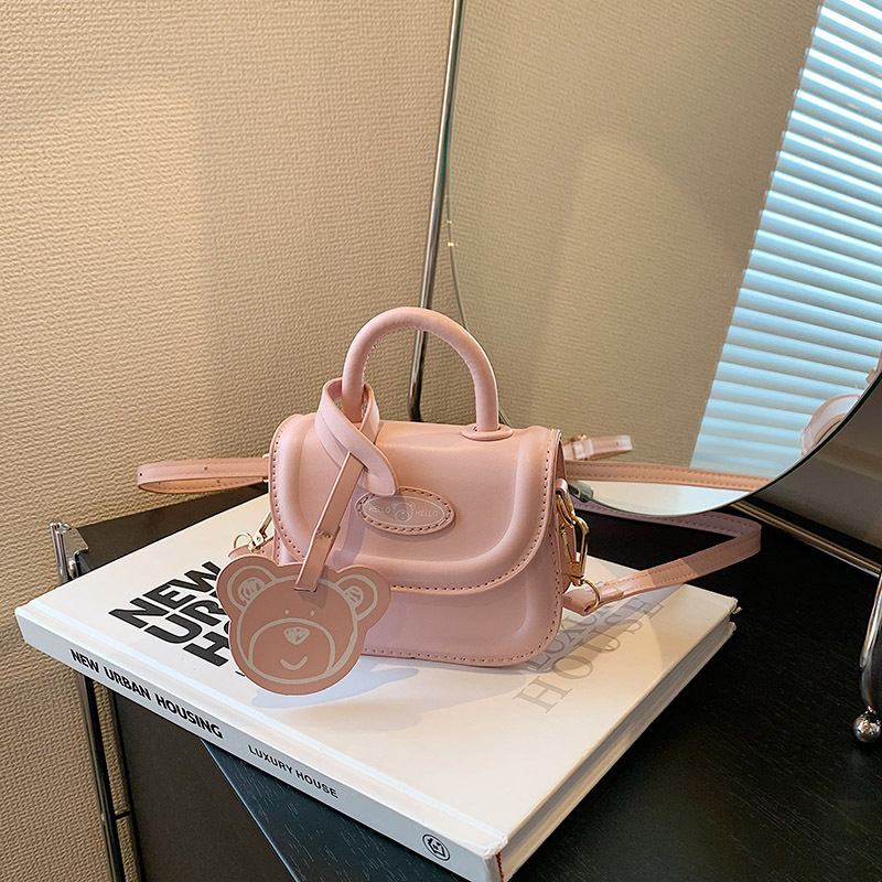2023 otoño nuevo estilo coreano nicho niños mini mano de la muchacha llevar crossbody accesorios lápiz labial pequeña bolsa al por mayor