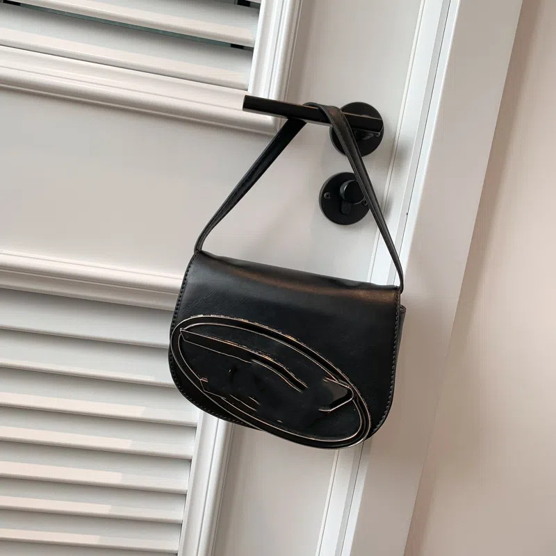 Diseño de nicho Dingdong Bag 2025 nueva moda estilo occidental todo fósforo bolso de mensajero portátil cadena acrílica pequeño bolso cuadrado