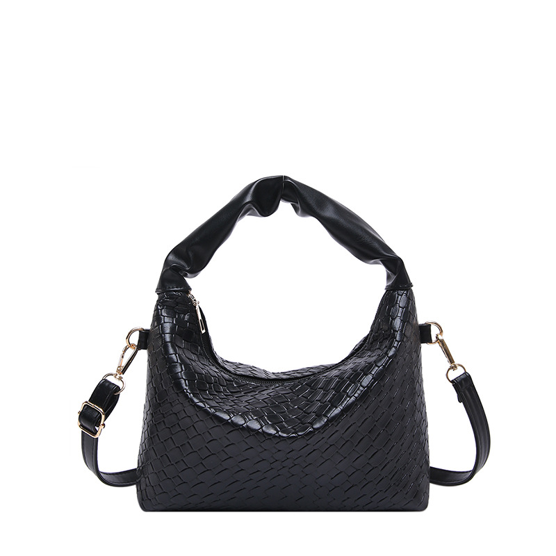 Este año bolsos populares de mujer diseño de tejido bolsos de mochila coreanos bolsos de transporte de aire extranjero 2024 nueva moda bolsos de hombro