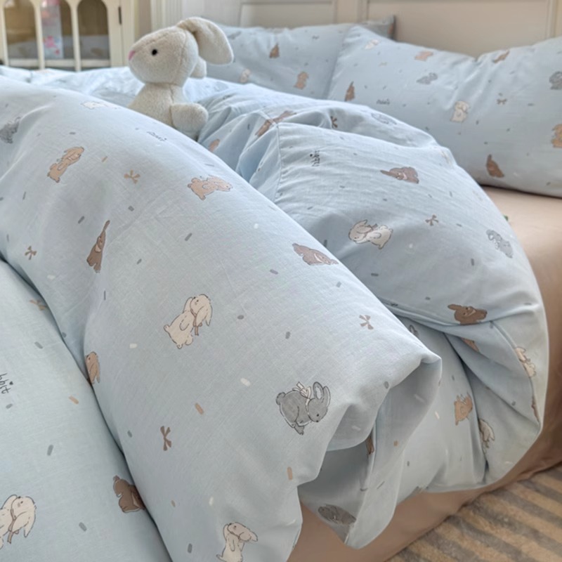 Cama de hilo de doble capa de algodón estilo ins Juego de cuatro piezas Funda de edredón de algodón puro para niños 2025 Nuevo juego de tres piezas de dormitorio de sábanas