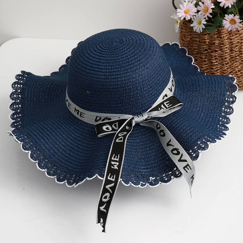 Sombrero de paja de viaje de verano flor sombrero de playa protección solar sombrero de sol ala grande paja tejida a mano arco sombrero de sol